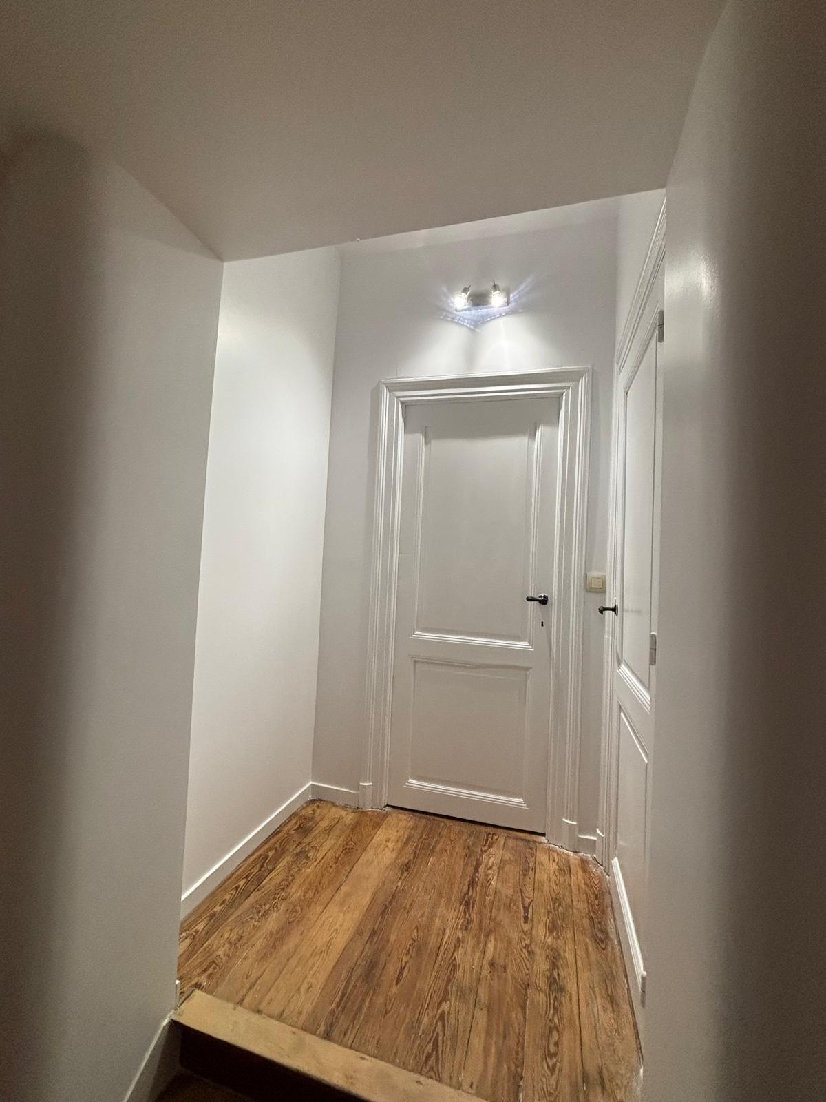 Couloir après rénovation - réalisation T-Construct